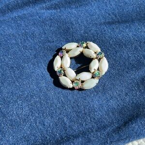Vintage Brooch of Milk glass and aurora borealis rhinestones.